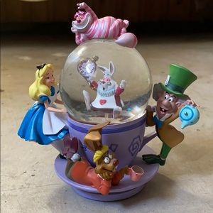 Alice in wonderland snow globe